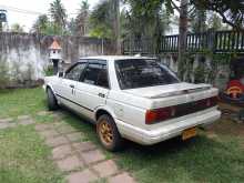 https://riyasewana.com/uploads/nissan-b12-full-26621494223.jpg