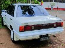 https://riyasewana.com/uploads/nissan-b12-trad-1989-318122812532.jpg
