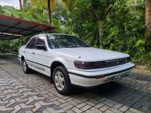 https://riyasewana.com/uploads/nissan-bluebird-su12-1990-109545512132.jpg