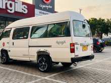 https://riyasewana.com/uploads/nissan-caravan-superlong-1999-2523304213002.jpg