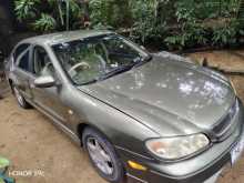 https://riyasewana.com/uploads/nissan-cefiro-a33-2003-1811150812312.jpg