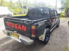 https://riyasewana.com/uploads/nissan-d-21-301703534132.jpg