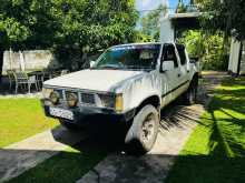 https://riyasewana.com/uploads/nissan-d21-1986-2414380612411.jpg
