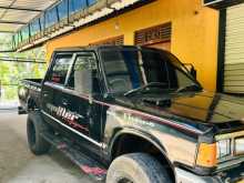 https://riyasewana.com/uploads/nissan-double-cab-1982-2511455012444.jpg