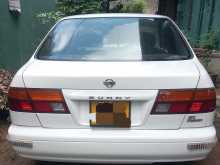 Nissan FB14 EX Saloon 1997 Car