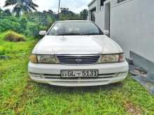 Nissan FB14 EX Saloon 1998 Car