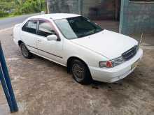 Nissan FB14 Ex Saloon Red Light 1997 Car