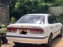 https://riyasewana.com/uploads/nissan-fb-15-2001-2822474012842.jpg