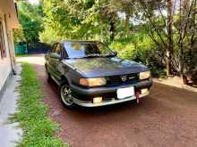 Nissan FB13 Doctor Sunny Super Saloon 1991 Car