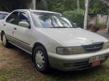 Nissan FB14 EX Saloon 1997 Car
