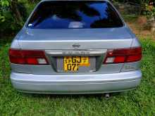 Nissan FB14 Ex Saloon 1998 Car