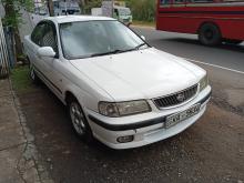 Nissan FB15 2001 Car