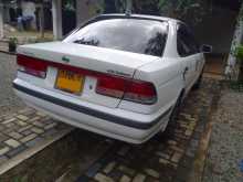 Nissan FB15 1999 Car