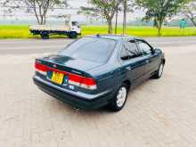 Nissan FB15 1999 Car
