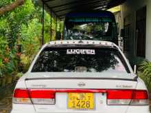 Nissan FB15 2001 Car