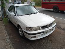 Nissan FB15 2001 Car