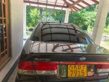 Nissan FB15 EX Saloon 2001 Car