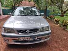 Nissan FB15 EX Saloon 2000 Car