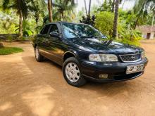 Nissan FB15 EX Saloon 1999 Car