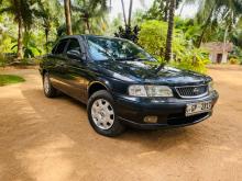 Nissan FB15 EX Saloon 1999 Car