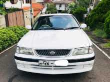 Nissan FB15 Sunny EX Saloon 1999 Car