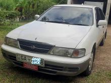 Nissan FD14 EX Saloon 1997 Car