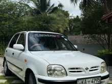 Nissan MARCH 2002 Car