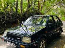https://riyasewana.com/uploads/nissan-march-k10-1987-1315312512742.jpg