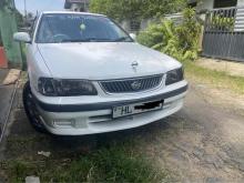 Nissan FB15 EX Saloon 2000 Car