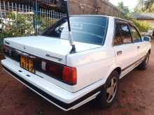 https://riyasewana.com/uploads/nissan-trad-sunny-1990-312460112393.jpg