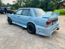 https://riyasewana.com/uploads/nissan-trad-sunny-1998-1814580912894.jpg