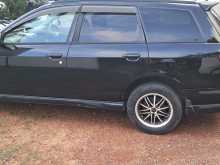 Nissan Wingroad WFY11 2001 Car