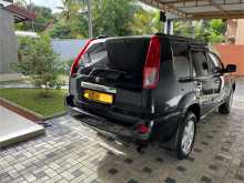 https://riyasewana.com/uploads/nissan-x-trail-facelift-2006-1312304212313.jpg