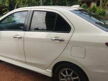 https://riyasewana.com/uploads/perodua-bezza-1616302210943.jpg