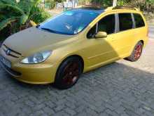 https://riyasewana.com/uploads/peugeot-307-sw-2003-2416461912914.jpg