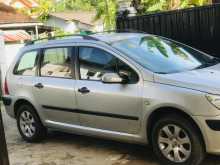 https://riyasewana.com/uploads/peugeot-307-sw-2823302921.jpg