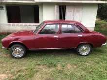 https://riyasewana.com/uploads/peugeot-504-gr-1985-1022272412234.jpg