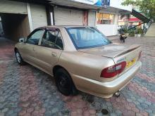 https://riyasewana.com/uploads/proton-wira-28853296366.jpg