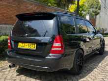 https://riyasewana.com/uploads/subaru-forester-sg09-2001-212042012272.jpg