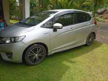 https://riyasewana.com/uploads/suzuki-fit-gp5-2014-2213563612402.jpg