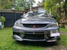 https://riyasewana.com/uploads/suzuki-lancer-cs1-2006-57354612233.jpg
