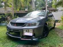 https://riyasewana.com/uploads/suzuki-lancer-cs1-2006-57354612511.jpg