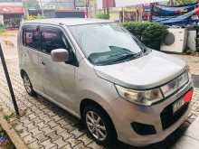 https://riyasewana.com/uploads/suzuki-stingray-vxi-181341474352.jpg
