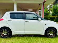 https://riyasewana.com/uploads/suzuki-swift-beetle-2007-239431912602.jpg