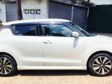 https://riyasewana.com/uploads/suzuki-swift-rs-2017-212541412453.jpg