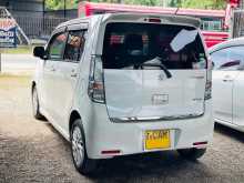 https://riyasewana.com/uploads/suzuki-wagonr-stingray-2613324122513.jpg