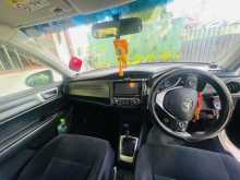 https://riyasewana.com/uploads/toyota-axio-2014-32495012104.jpg