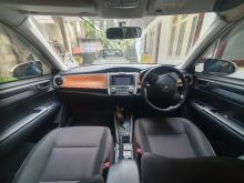 https://riyasewana.com/uploads/toyota-axio-fielder-28915596795.jpg