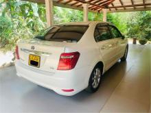 https://riyasewana.com/uploads/toyota-axio-nke-2711583624011.jpg