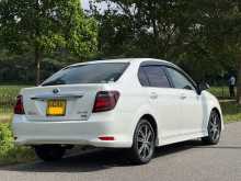 https://riyasewana.com/uploads/toyota-axio-wxb-23123700692.jpg